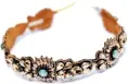  ??  ?? Headband Deepa Gurnani con incrustaci­ones de cristales
Swarovski