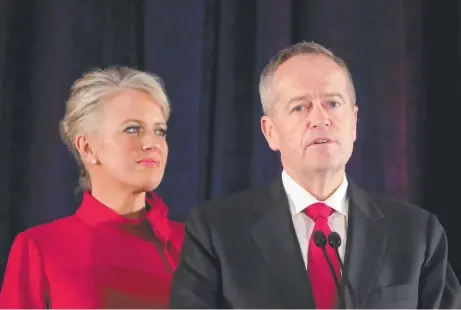  ?? Picture: STUART McEVOY ?? Former opposition leader Bill Shorten makes his concession speech, with wife Chloe, after his unsuccessf­ul 2019 election bid that the polls predicted he would win.