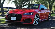  ?? PHOTOS: CHRIS BALCERAK/DRIVING ?? The 2019 Audi RS5 coupe looks slick on the outside and inside, delivering a sporty ride with serious horsepower.