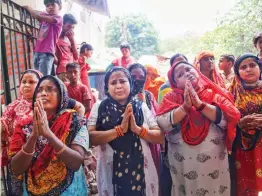  ?? — PTI ?? Locals stage a protest during an anti-encroachme­nt drive at Karol Bagh in New Delhi on Thursday.