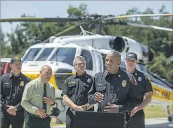  ?? Mel Melcon Los Angeles Times ?? L.A. COUNTY Fire Chief Daryl Osby speaks Thursday at Fire Camp 2 in La Cañada Flintridge. Current conditions, including the drought, he says, will make it harder to fight wildfires this year.