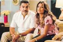  ??  ?? Carlos Gomez, left, and Lisa Vidal in a scene from The Baker and the Beauty. ABC cancelled the show this month.