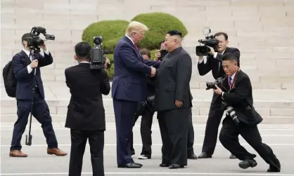  ?? Photograph: Kevin Lamarque/Reuters ?? Donald Trump meeting North Korean leader Kim Jong-un at the demilitari­zed zone separating the two Koreas, in Panmunjom, South Korea, on 30 June 2019.