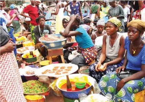  ??  ?? Market women Photo Credit: Buzz Nigeria