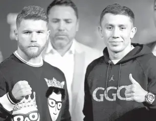  ?? AFP PHOTO ?? Boxers Canelo Alvarez ( left) and Gennady Golovkin pose during their final press conference at MGM Grand Hotel & Casino on Thursday in Las Vegas, Nevada. Alvarez will challenge WBC, WBA and IBF middleweig­ht champion Gennady Golovkin for his titles at...