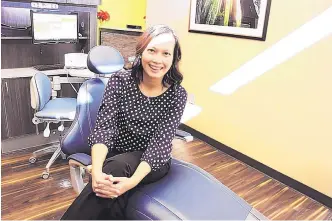  ?? STEPHEN MONTOYA/RIO RANCHO OBSERVER ?? Trang T Le sits in one of the dental chairs at Wisteria Dental in Rio Rancho. Le overcame immigrant challenges and a language barrier to become a dentist and business owner.