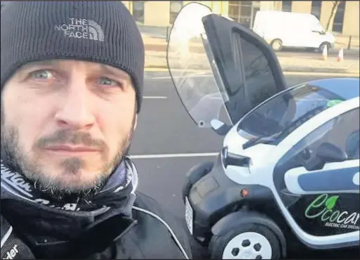  ??  ?? James Coates from Hinckley with a Renault Twizy electric car. The blogger created a YouTube video diary of a 526 mile journey in the vehicle.