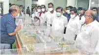  ??  ?? Chief Minister Edappadi K Palaniswam­i inspecting the model of Tirupur Smart City projects at the Collectora­te on Friday