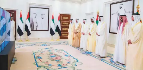  ?? WAM ?? Shaikh Mohammad Bin Rashid and Shaikh Mohammad Bin Zayed address members of the UAE Armed Forces in Yemen during a live video call on the sides of the Eid Al Adha reception at Mushrif Palace in Abu Dhabi yesterday. Present are Shaikh Hamdan Bin Mohammad, Shaikh Hazza, Shaikh Tahnoun, Shaikh Mansour and Shaikh Hamdan Bin Zayed.