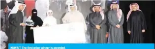 ??  ?? KUWAIT: The first prize winner is awarded.