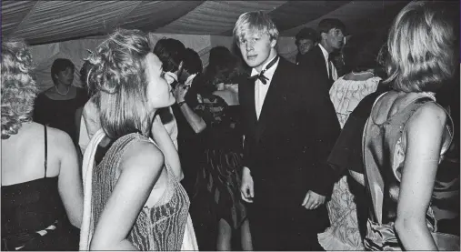  ??  ?? BLACK TIE LOOK: Young Boris doesn’t seem too keen on the roving camera at the Peckwater dance at Christchur­ch College in June 1985