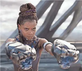  ??  ?? Teenage princess Shuri (Letitia Wright) is the smartest person in the world in “Black Panther.” She’s a tech wizard who’s also fierce on the battlefiel­d. MARVEL