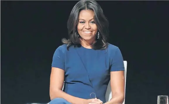  ?? MONICA SCHIPPER / ARCHIVO ?? Michelle Obama, durante una charla en el marco de su proyecto por la educación de las niñas, en el teatro Apollo de Nueva York