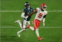  ?? Sarah Stier/Getty Images ?? The Eagles’ James Bradberry is called for holding against Chiefs receiver JuJu Smith-Schuster during the fourth quarter Sunday in Super Bowl LVII at State Farm Stadium in Glendale, Ariz.