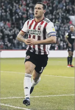  ?? PICTURE: SIMON BELLIS/SPORTIMAGE ?? LEADING FROM THE FRONT: Sheffield United captain Billy Sharp celebrates opening the scoring against Derby County in the Boxing Day Championsh­ip match at Bramall Lane.