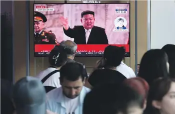  ?? GETTY IMAGES ?? People in Seoul watch a news report about Kim Jong-un after North Korea’s failed attempt to launch a spy satellite in August. The past year has shown the North Korean leader’s ability to adjust to changing geopolitic­al realities.