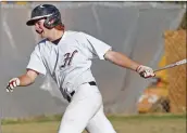  ?? Katharine Lotze/The Signal ?? Hart’s Trever Coogan (69) smiles as he heads for first base during a baseball game against Canyon at Hart on Monday.