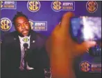  ?? The Associated Press ?? NOT BACKING DOWN: Arkansas defensive lineman McTelvin Agim speaks to reporters Wednesday during the NCAA Southeaste­rn Conference media days in Hoover, Ala. Agim said that the Razorbacks are working hard every day to rebuild the program into a championsh­ip caliber team.