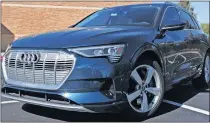  ?? [OKLAHOMAN ARCHIVES] ?? An Audi e-tron is seen. Utilities are upgrading their systems with an expectatio­n more of their customers will acquire electric vehicles.