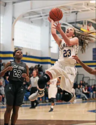  ?? RANDY MEYERS — THE MORNING JOURNAL ?? Clearview’s Brooke Rebman drives down the lane and through the Lorain defense as she scores during the second quarter.