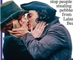  ??  ?? ATTRACTION: Ross (Aidan Turner) and Demelza (Eleanor Tomlinson) and their famous Poldark kiss