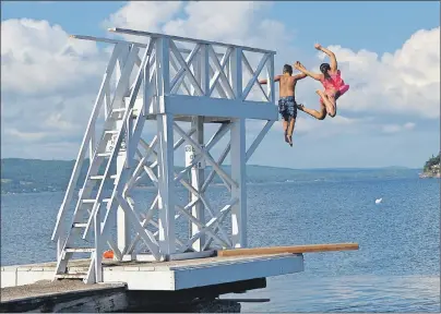  ?? DAVID JALA/CAPE BRETON POST ?? Jumping off the resort’s diving tower has been a rite of passage for children for more than 50 years.