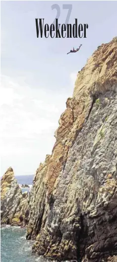  ??  ?? A cliff diver jumps at La Quebrada in Acapulco.