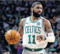  ?? AP PHOTO ?? In this Feb. 28, file photo, Boston Celtics guard Kyrie Irving (11) moves down court during the first quarter of an NBA basketball game in Boston.