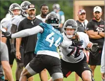  ?? HYOSUB SHIN/HYOSUB.SHIN@AJC.COM ?? Jaguars linebacker/defensive end Travon Walker (44) works against Falcons tackle Kaleb Mcgary during a joint practice Thursday in Flowery Branch. Walker, the No. 1 overall pick in the draft, has shown promise in two preseason games.