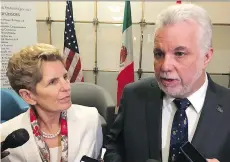  ?? THE CANADIAN PRESS ?? Ontario Premier Kathleen Wynne and Quebec Premier Philippe Couillard speak to reporters in Washington on Friday after meeting with U.S. governors on the issue of free trade.