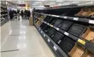  ?? Photograph: David Young/PA ?? Depleted shelves in Sainsbury’s at the Forestside shopping centre in Belfast.