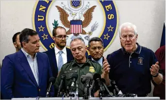  ?? DAVID J. PHILLIP / AP ?? U.S. Senator John Cornyn, R-Texas, (right) answers a question during a news conference after a roundtable discussion Friday on immigratio­n in Weslaco. Joining him are fellow Sen. Ted Cruz, R-Texas, (left) and Rio Grande Valley Sector Chief Patrol Agent Manuel Padilla.