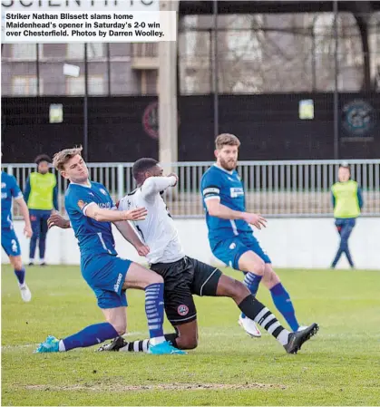  ??  ?? Striker Nathan Blissett slams home Maidenhead's opener in Saturday's 2-0 win over Chesterfie­ld. Photos by Darren Woolley.