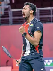  ?? AFP ?? India’s H. S. Prannoy reacts after defeating Indonesia’s Jonatan Christie 18-21, 21-16, 23-21 in their men’s singles first round match at the Thailand Open badminton tournament in Bangkok on Tuesday. —