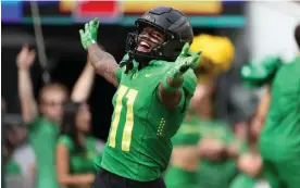  ?? Loman/AP ?? Oregon wide receiver Troy Franklin celebrates after scoring a touchdown against Colorado during the first half of Saturday’s game in Eugene, Oregon. Photograph: Amanda