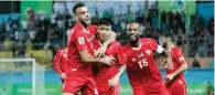  ?? – AFP ?? CRUCIAL POINTS: Palestine players celebrate during their match against Oman in West Bank on Tuesday night.