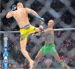  ?? Photo / AP ?? Brazil’s Alex Pereira lands a kick in his UFC 281 title fight against New Zealand’s Israel Adesanya.
