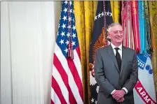  ?? JABIN BOTSFORD/WASHINGTON POST ?? Secretary of Defense Jim Mattis listens as President Donald Trump speaks during a White House reception Oct. 25 commemorat­ing the 35th anniversar­y of the attack on the Beirut barracks.