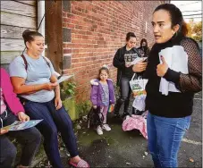  ?? Melanie Stengel / C-Hit.org ?? Laura Garcia speaks to women and passes out leaflets in a parking lot in Norwalk. She lost a baby and was in danger of losing her life. Garcia believes her concerns about her pregnancy were ignored, in part, because she is an undocument­ed immigrant, and now advocates for better reproducti­ve care for women in marginaliz­ed communitie­s.