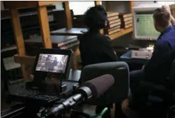  ?? Gazette file photo ?? Joshua Zeman and Rachel Mills research old newspaper accounts of the Phantom Killer case in the archives of the Texarkana Gazette in July of last year.