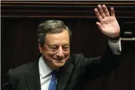  ?? The Associated Press ?? ■ Italian Premier Mario Draghi waves to lawmakers at the end of his address Thursday at the Parliament in Rome.