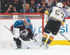  ?? David Zalubowski, The Associated Press ?? Avalanche goaltender Semyon Varlamov blocks a shot by Golden Knights forward David Perron during the teams’ shootout in Saturday afternoon’s game at the Pepsi Center in Denver. Colorado won the game 2-1.