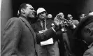  ?? Photograph: HC/ASSOCIATED PRESS ?? CT Vivian leads a prayer on the courthouse steps in Selma, Alabama, after James Clark (rear) stopped him at the door in Selma, Alabama, on 5 February 1965.