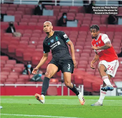  ??  ?? Decisive say: Reiss Nelson fires home the winner for
Arsenal at the Emirates