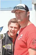  ?? DAVE KALLMANN / MILWAUKEE JOURNAL SENTINEL ?? Travis Kvapil, the 2003 NASCAR truck champion, has given son Carson his first opportunit­ies in the Midwest Truck Series and TUNDRA super-late models this year.