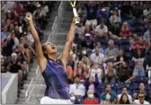  ?? JOHN MINCHILLO — THE ASSOCIATED PRESS ?? Leylah Fernandez, of Canada, reacts after defeating Angelique Kerber, of Germany, during the fourth round of the U.S. Open on Sunday in New York.