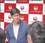  ?? Associated Press ?? The Angels’ Shohei Ohtani speaks to reporters after he returned home on Oct. 18, at the Haneda internatio­nal airport in Tokyo, Japan. Ohtani, the Yankees’ Aaron Judge and the Astros’ Yordan Alvarez are AL MVP candidates.
