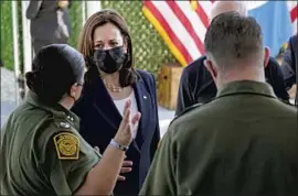  ?? GLORIA CHAVEZ Jacquelyn Martin Associated Press ?? of the U.S. Customs and Border Protection’s El Paso sector shows Vice President Kamala Harris around a migrant processing center Friday.