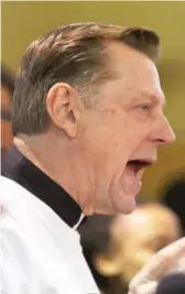  ?? SUN-TIMES FILE ?? Father Michael Pfleger speaks at St. Sabina Church in 2014.