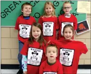  ?? Photo by Zane Vanderpool ?? PAWS Students of the Month for December, shown displaying their prize T-shirts, are Naomi Pruitt (left front), Christophe­r Guy and Couri Eden; Aaron Pearson (left rear), Malliya Davis and Garrett Haley.